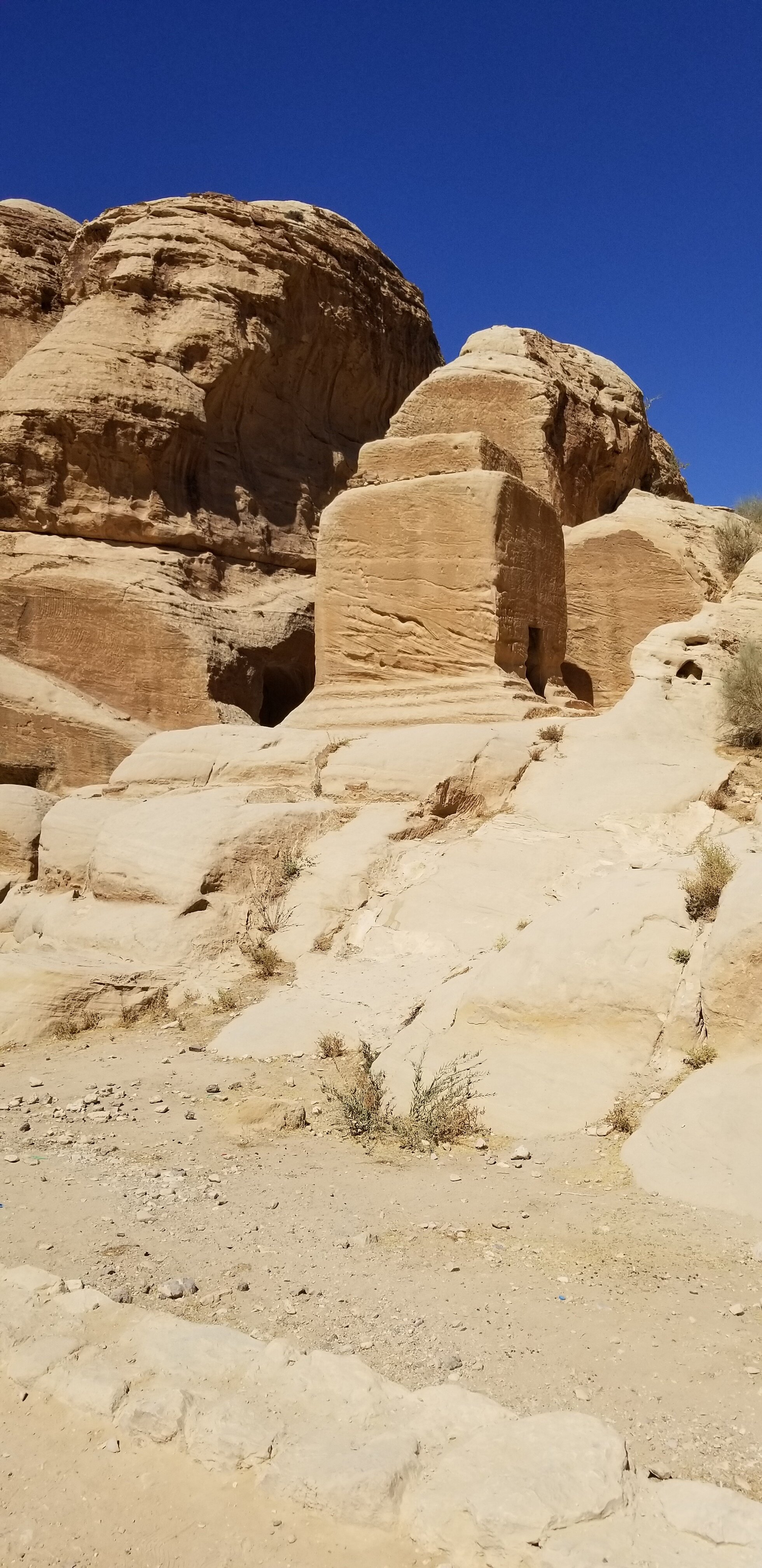  Photo of a “Djinn Box” from listener Kate Carlson taken when visiting Jordan while on active duty with the US Army in 2019.  These stone boxes are found on the trail through the ancient Nabatean city of Petra and Kate was told they were carved to tr