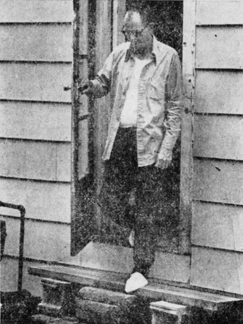  Henry McDaniel looks down at the spot on his doorstep where he first spotted the Enfield Monster. ©Photo by Tom Dunning for the  Evansville Courier and Press , May 9, 1973 