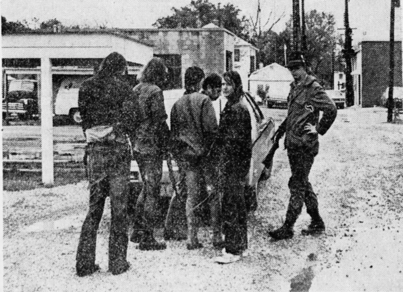  “White County Sheriff Roy Poshard Jr.  (fourth from left) ushers five young men into custody Tuesday following their arrest near Enfield, IL on firearms violations.” ©Photo by Tom Dunning for the  Evansville Courier and Press , May 9, 1973 