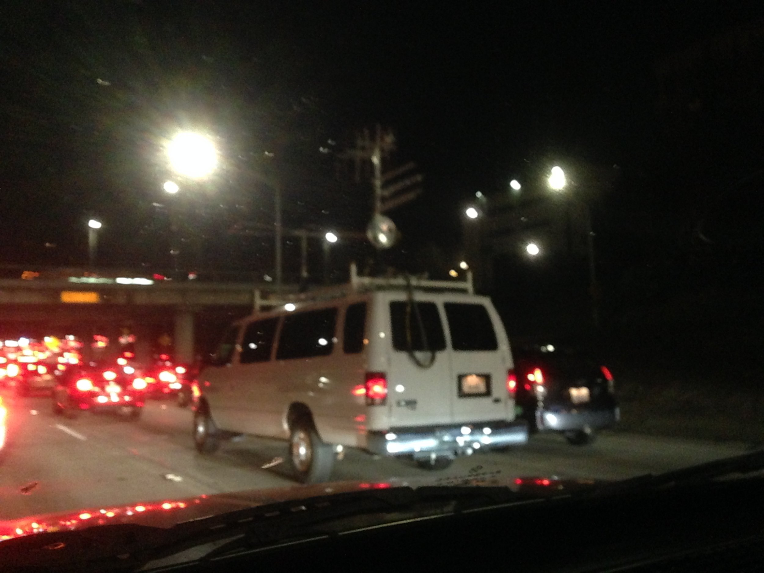  A mysterious unmarked communications van spotted by Forrest on the 110 Freeway in downtown LA, 1-17-2014 