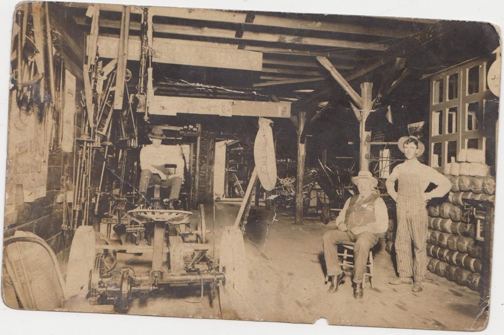  D.T. Griffith’s farm implements store in Van Meter with Bill Hazen.  Photo from the  City of Van Meter’s website  