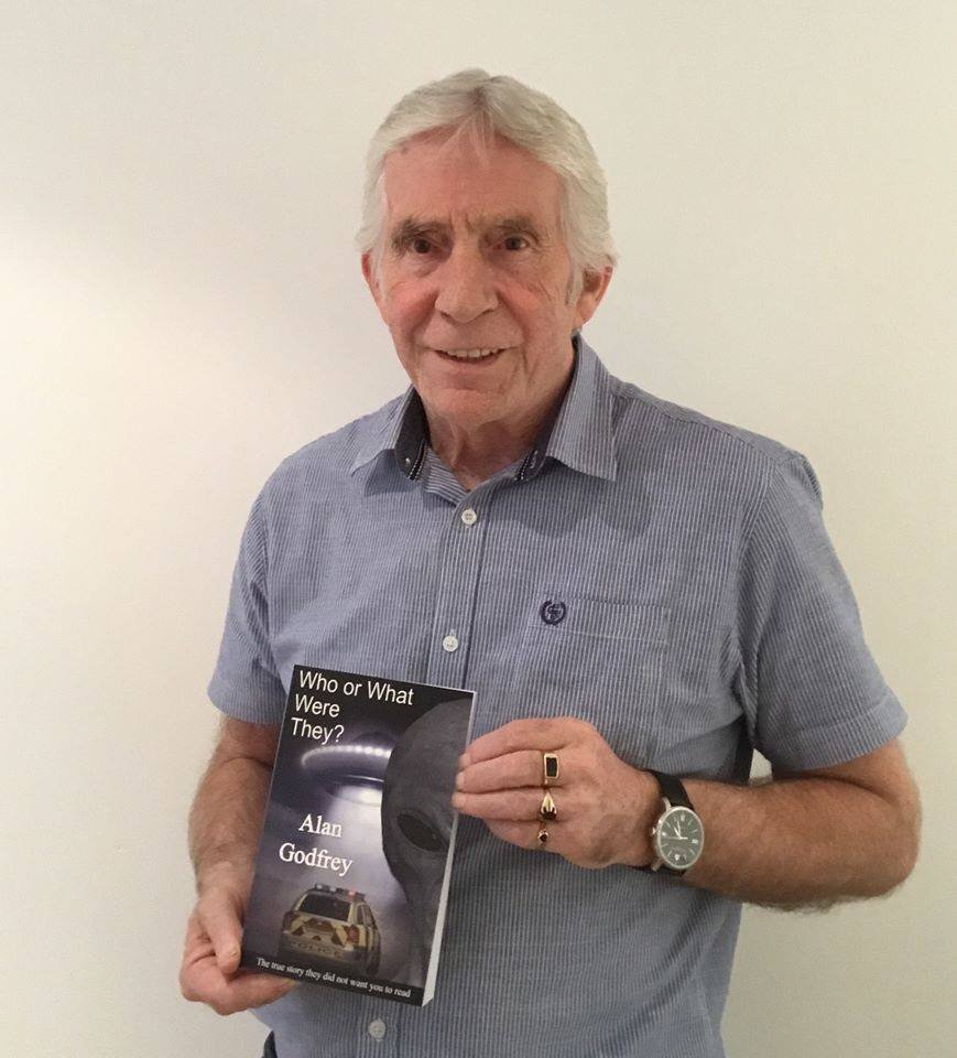  Former Todmorden Police Constable Alan Godfrey, with his book,   Who or What Were They?   