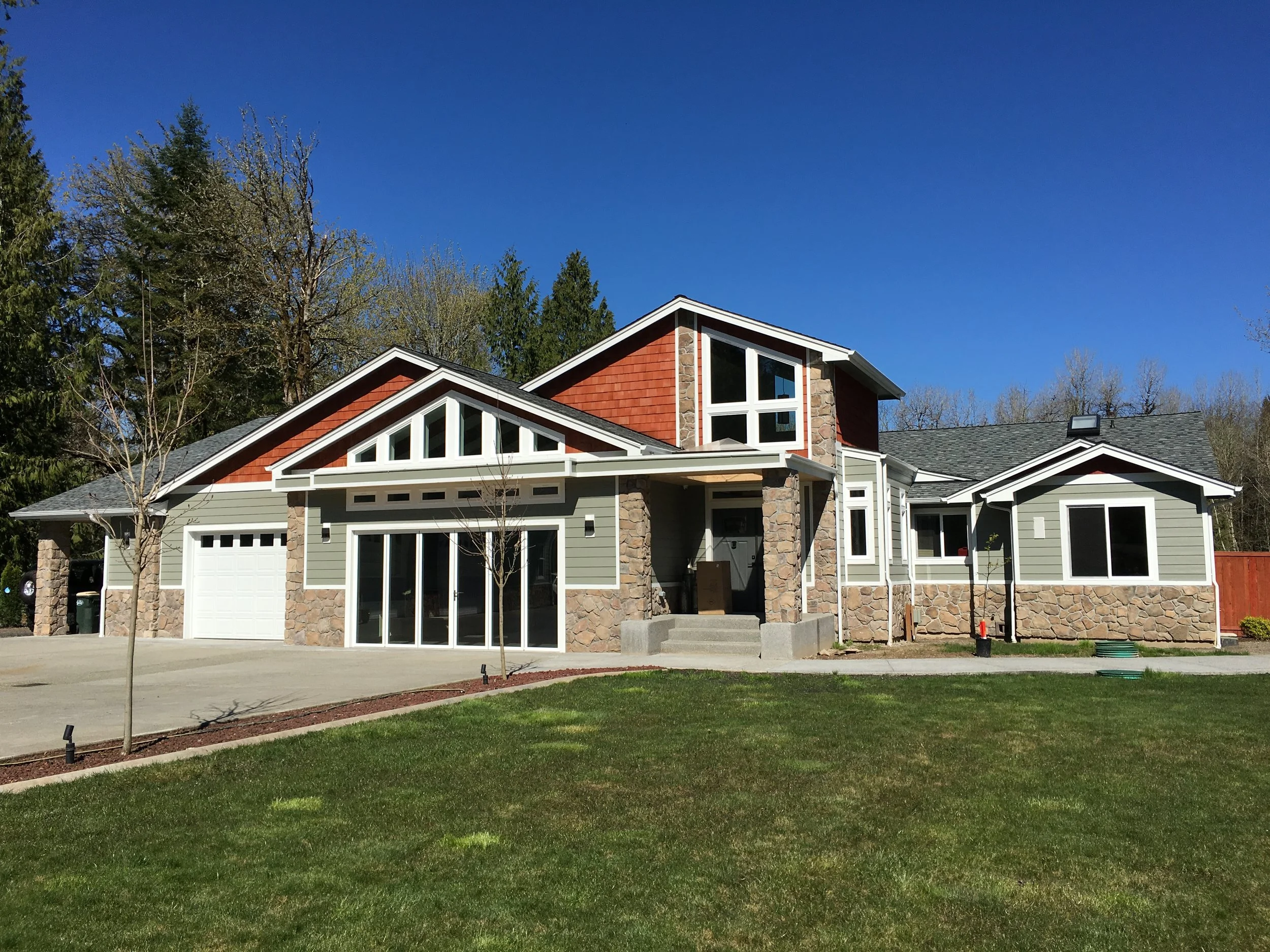 Ross's whole home remodel in Olympia - craftsman exterior with stone accents and covered porch - FoxHead Construction Thurston County