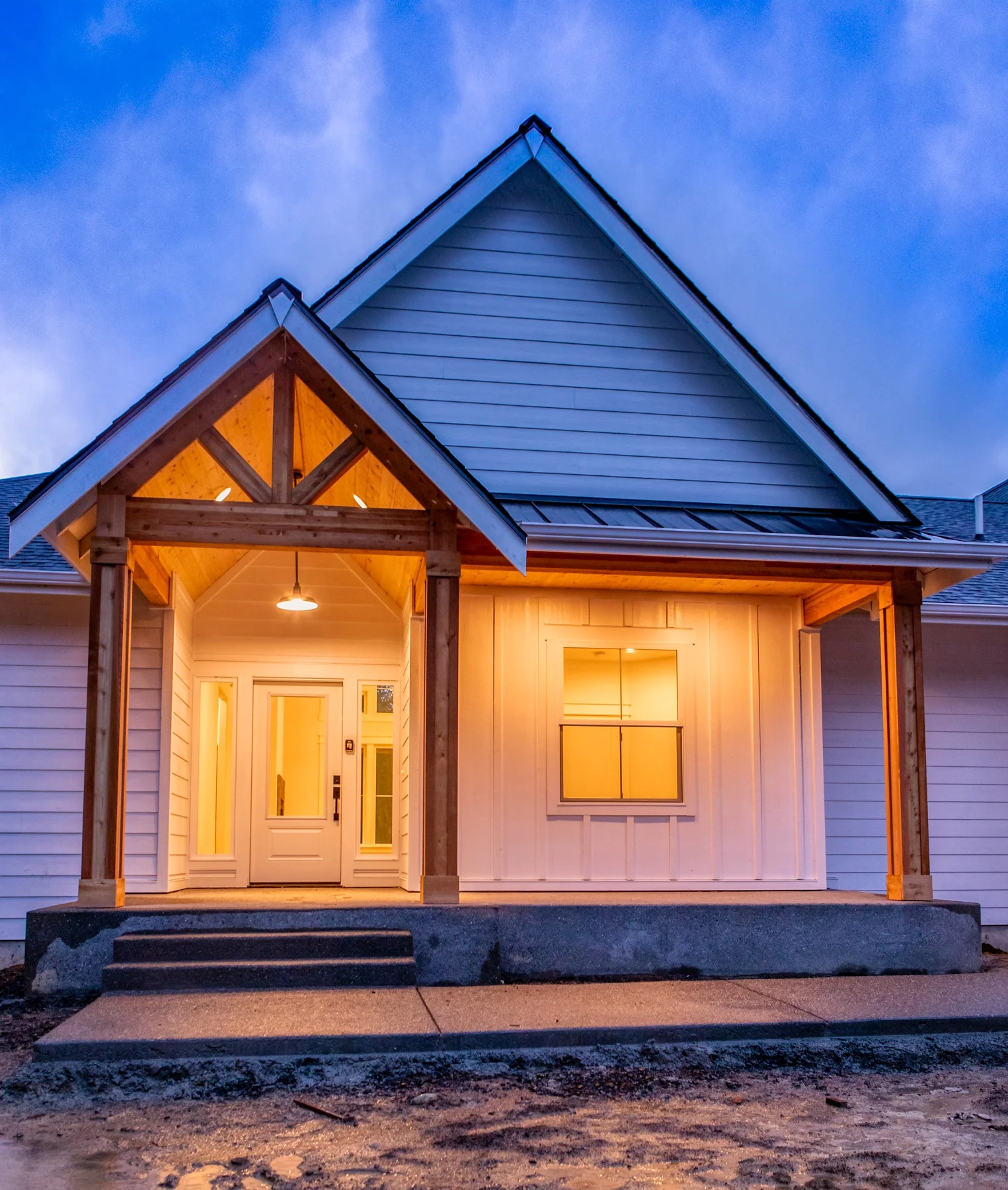 Ben's modern farmhouse custom home in Olympia featuring timber frame covered entry - FoxHead Construction Thurston County