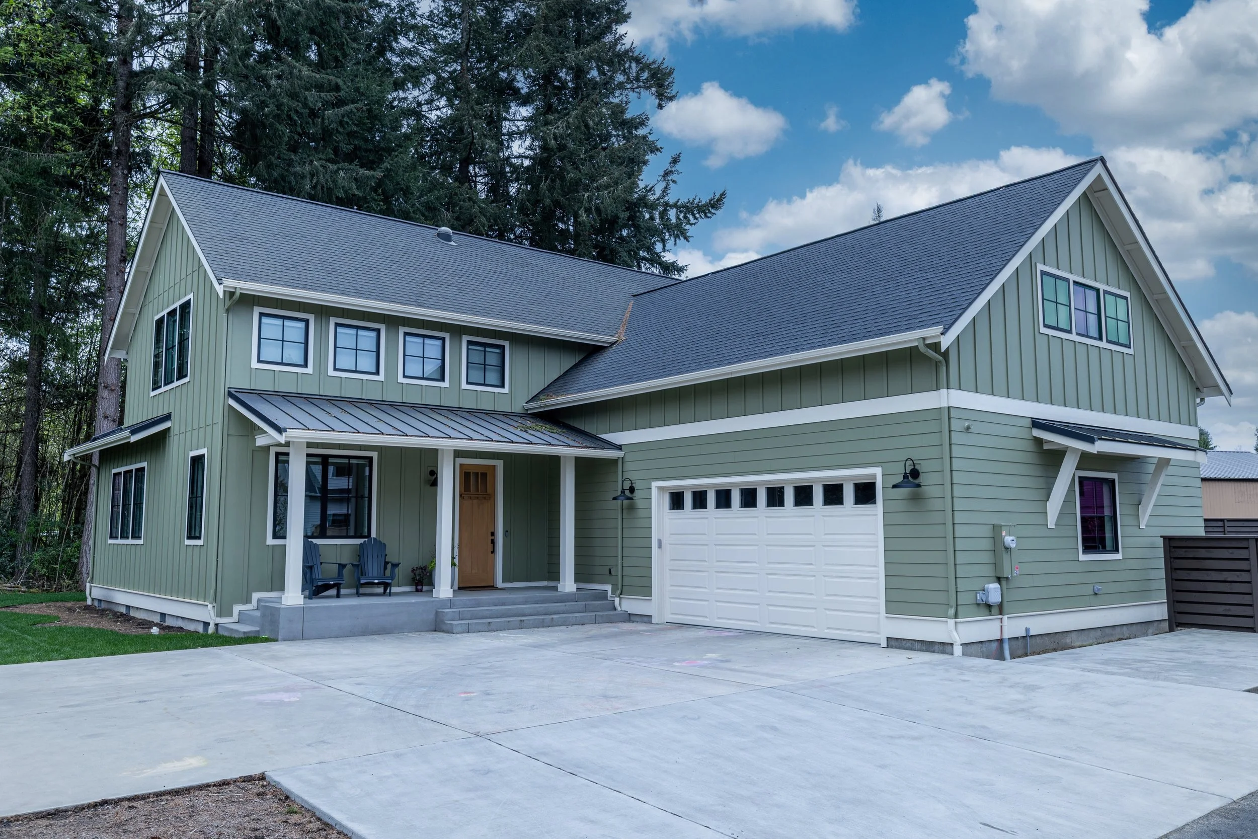 Joel's craftsman custom home in South Bay featuring covered entry porch and attached garage - FoxHead Construction Thurston County