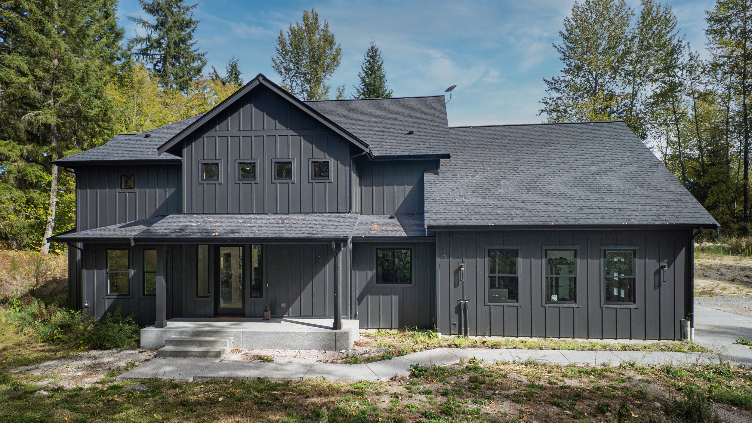 Troy's modern ranch custom home in Rainier featuring contemporary exterior design - FoxHead Construction Thurston County