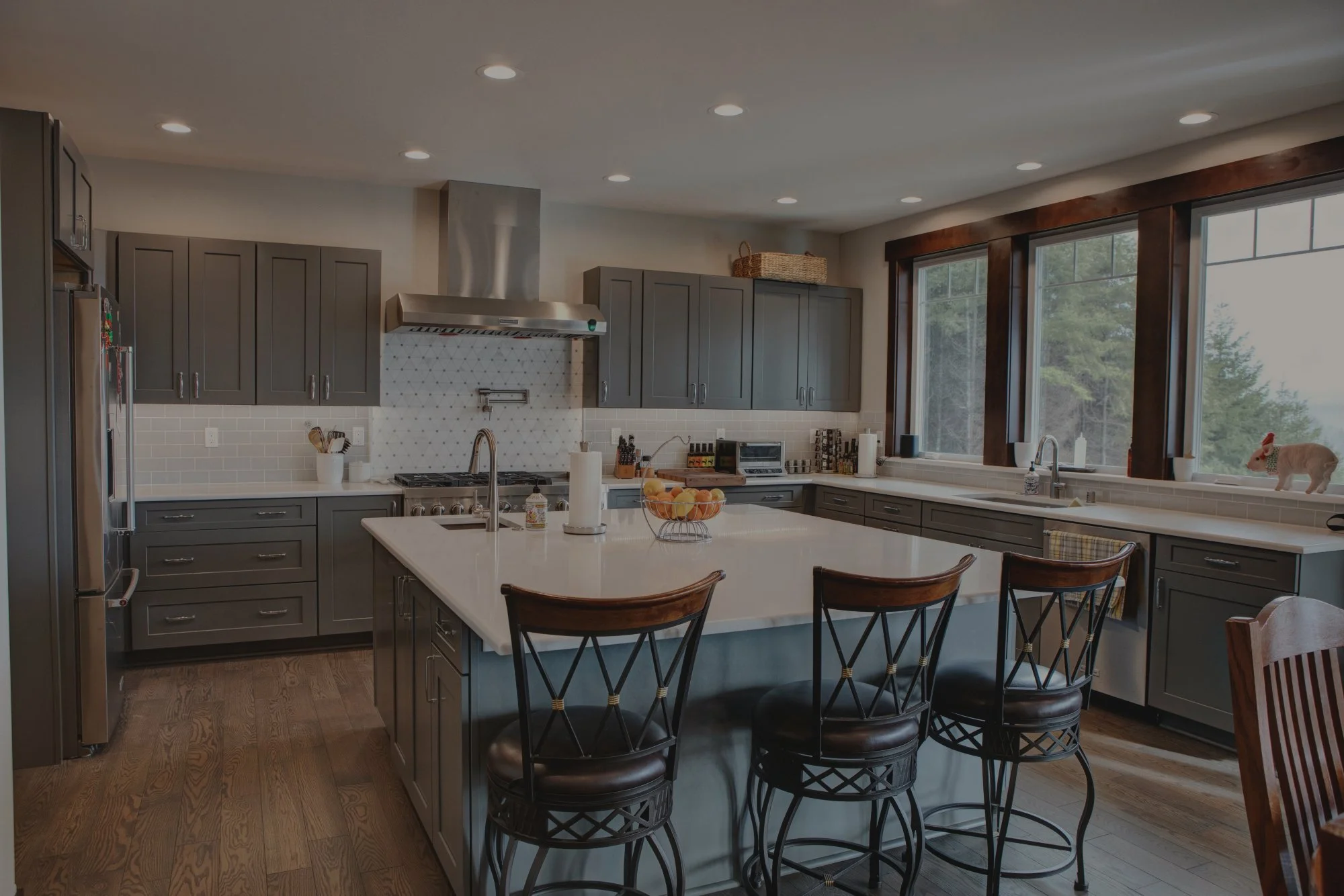 Stephen's custom home in Elma featuring gourmet kitchen with waterfall island and luxury finishes - FoxHead Construction Grays Harbor County