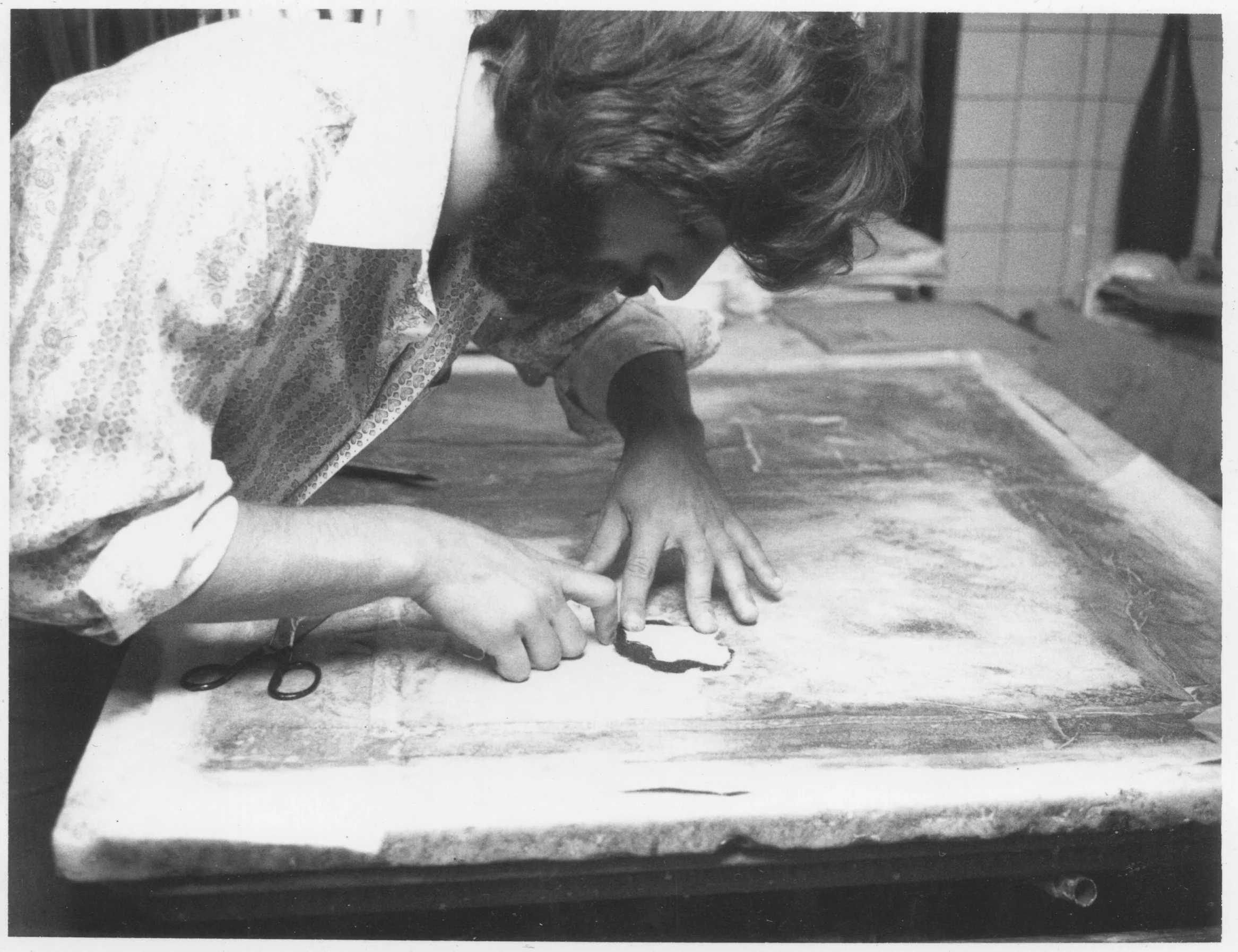 Steve Tatti Restoring Painting.jpg