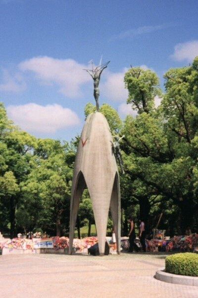 Sadako Sasaki memorial in Hiroshima, surrounded by paper cranes.