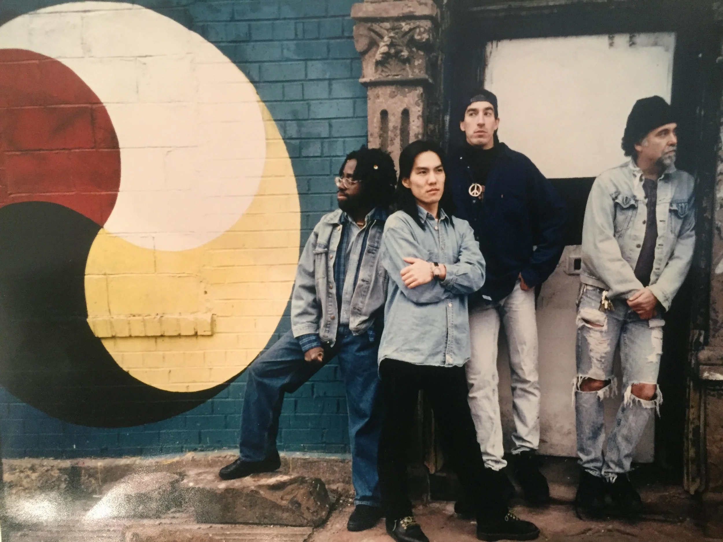 Biff Thuringer, aka Steve "Eyes" Hopkins (right) with the core of the band Milo Z in 1993. The other members are Smokin' Joe Copeland, Masa Shimizu, and Milo Z.