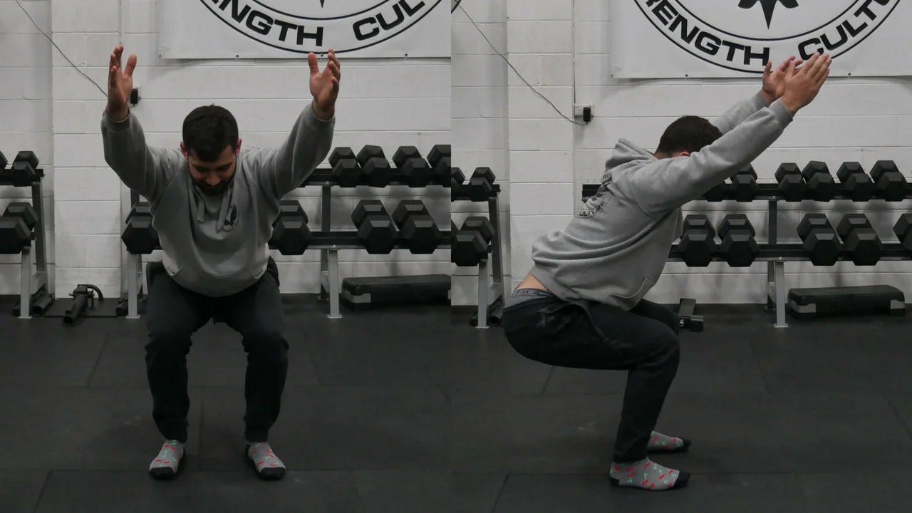 The bottom position of an Overhead Squat Assessment - Feet Under Hips, Toes Straight
