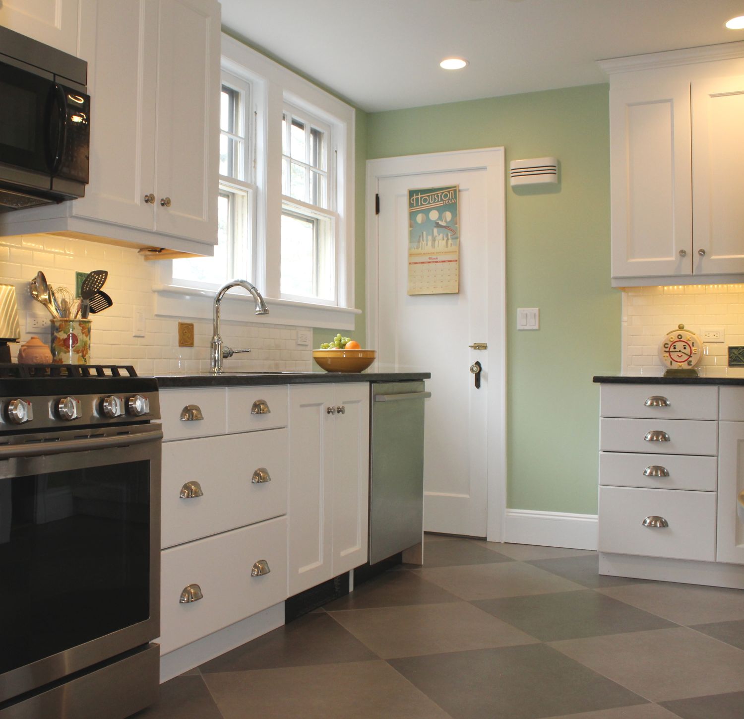 A kitchen with a checkered floor