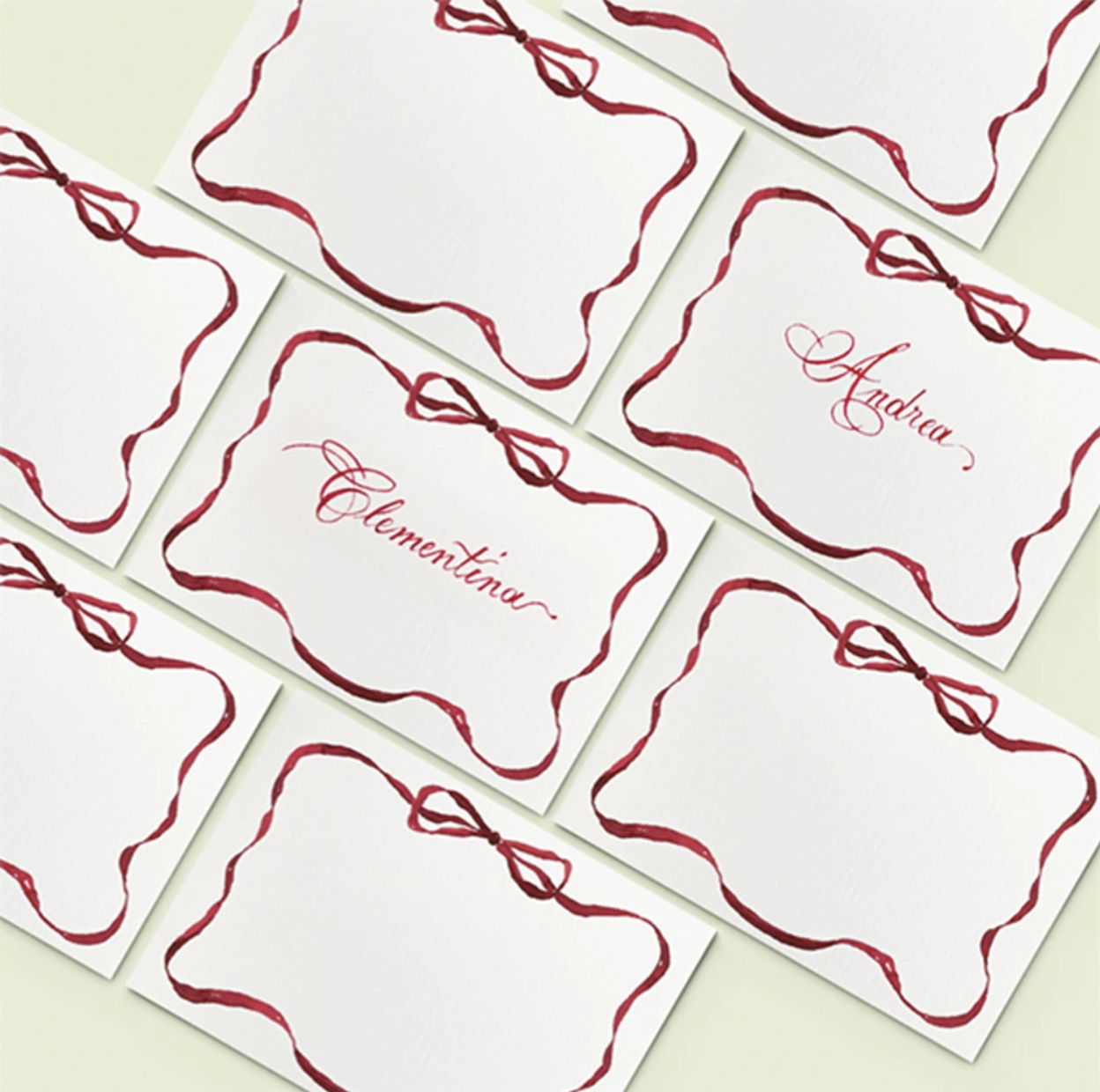 Courtland &amp; Co. HOLIDAY COLLECTION 2021 | FESTIVE RIBBON PLACE CARDS Festive Ribbon Place Cards Printed from Handpainted Design by Clemetina