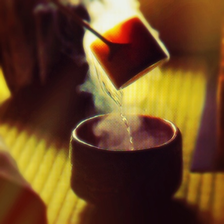 Steam rises from water poured from a hishaku (a traditional bamboo ladle) into a bowl of matcha (powdered green tea) in Hatsugama , the first tea of the new year.