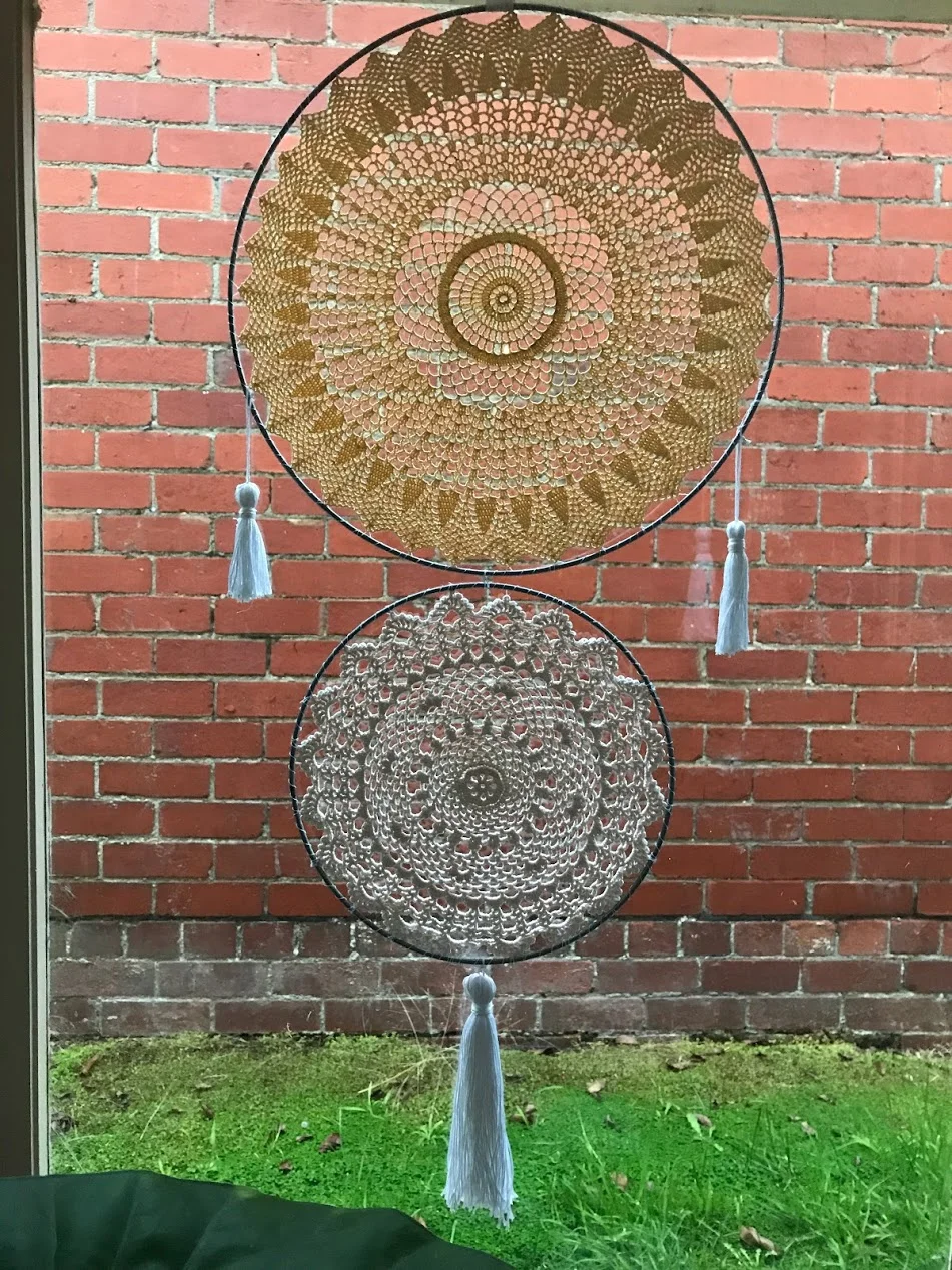 I admit to not being 'the dream catcher type' but here's a beauty by Cosmic Person Sharon in Ballarat using reclaimed family heirloom doilies and some clever craftiness