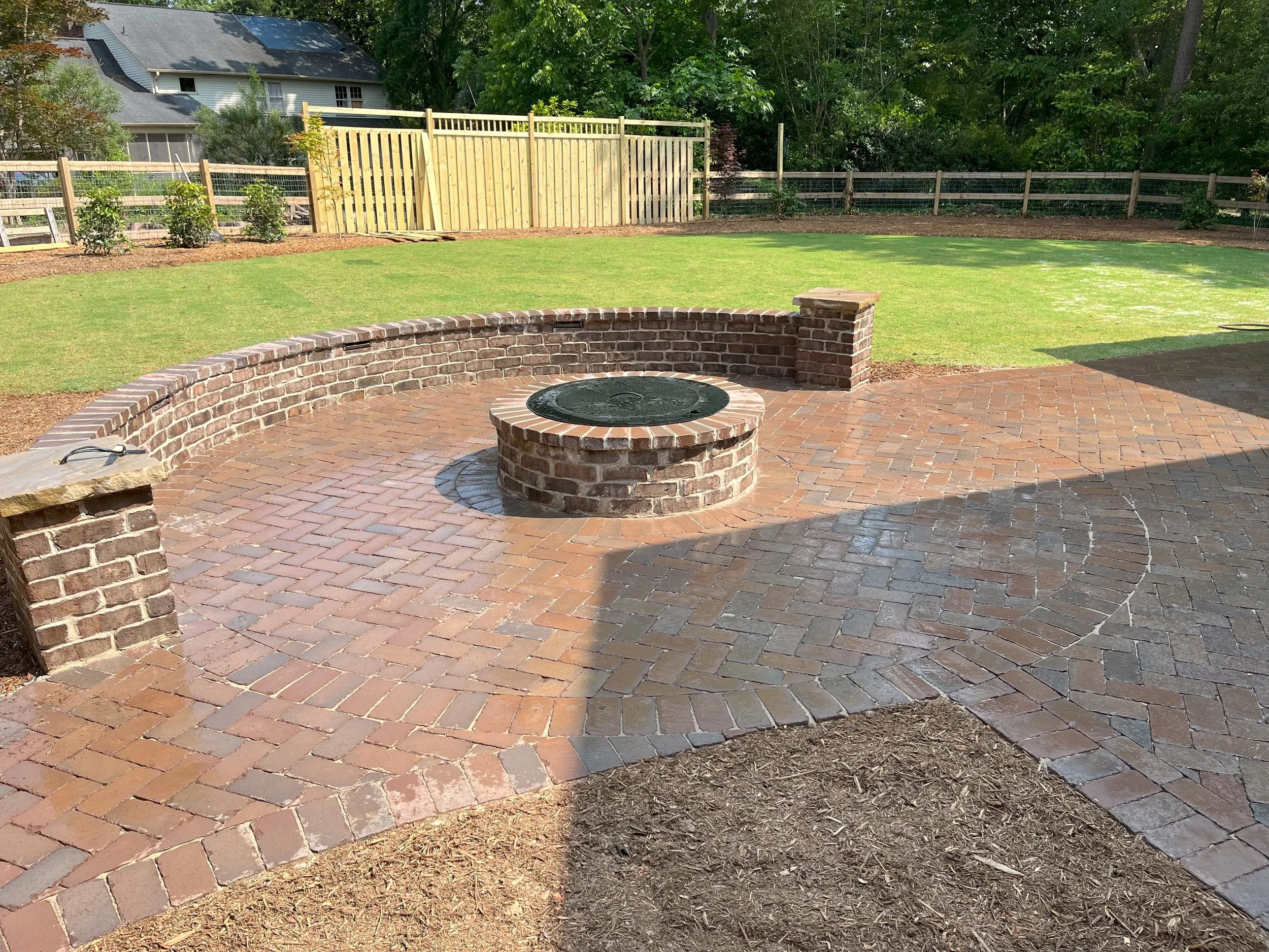 Detailed paver inlay pattern in custom patio in Mauldin, SC