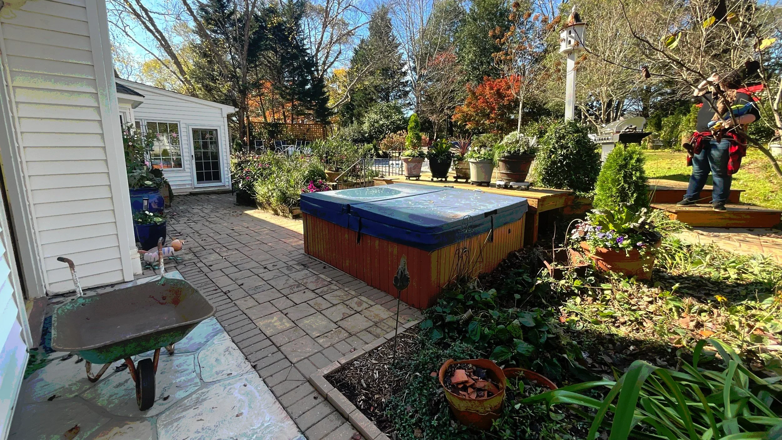 Custom backyard landscape design with paver patio in Greenville, SC