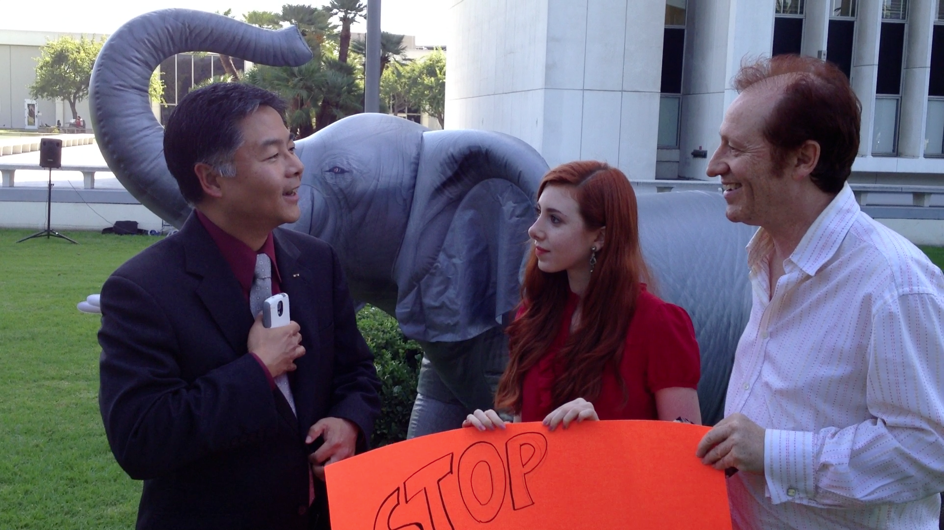 Congressman Ted Lieu meeting Huxleys at March For Elephants at the Federal building in LA