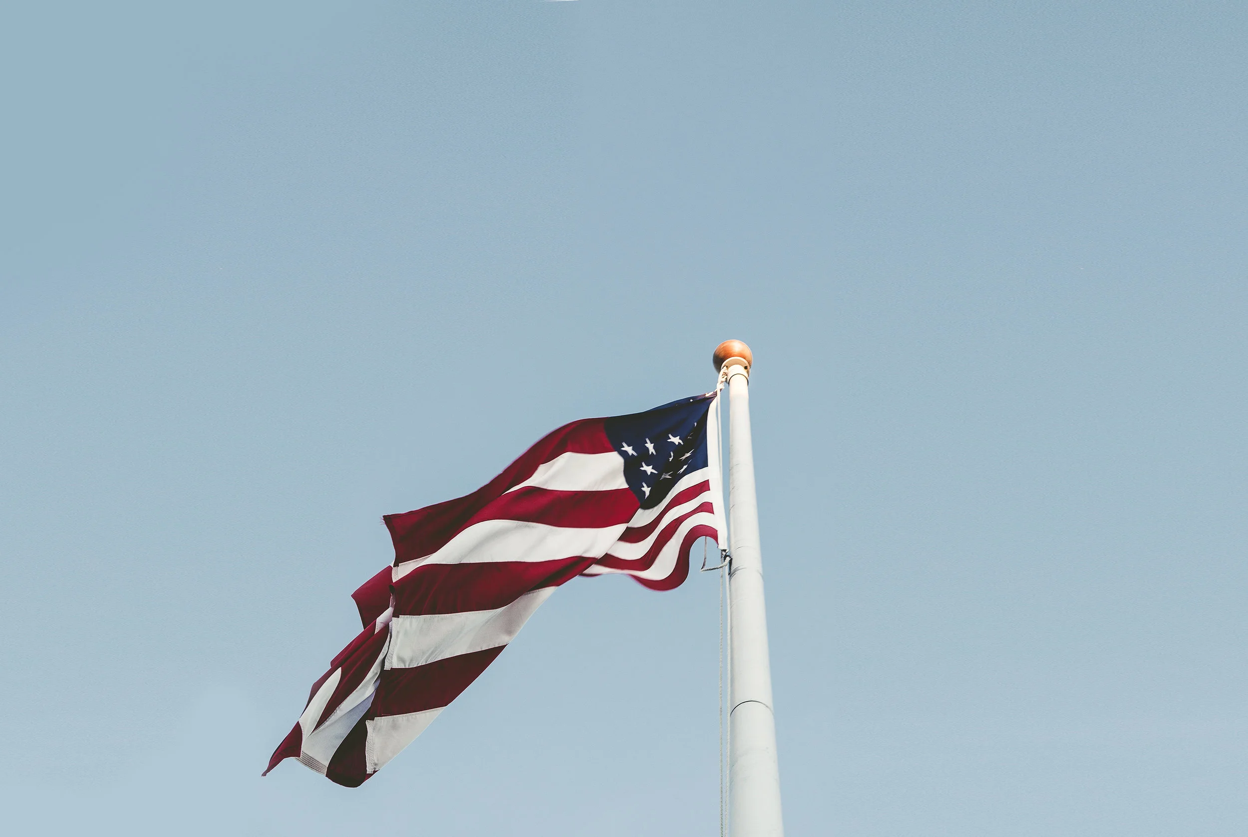 American flag waving on a flagpole