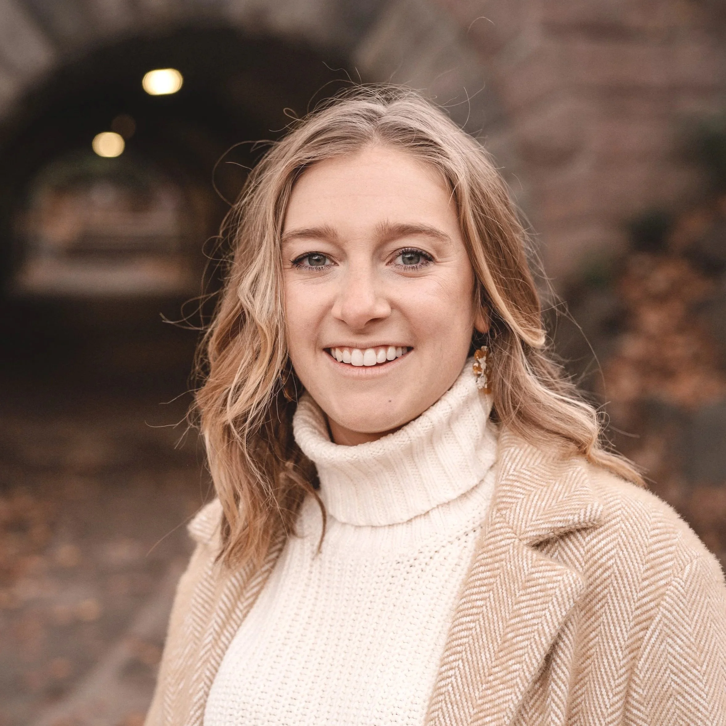 Kate Ramsdell wearing a tan coat, therapist in Richmond VA specializing in the treatment of eating disorders, grief, teens, anxiety