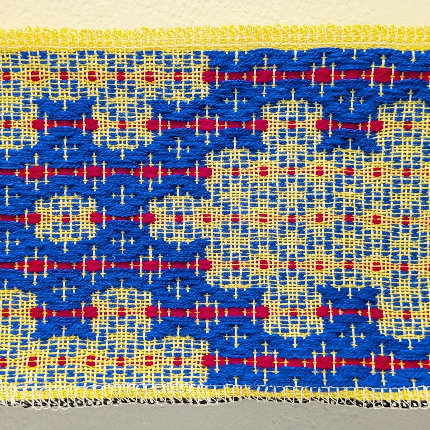 Juniors in Pauline Verbeek-Cowart's Weaving Studio class had critique today on their advanced weave round robin, where student groups set up different looms with weave structures and took turns exploring the possibilities on the loom.