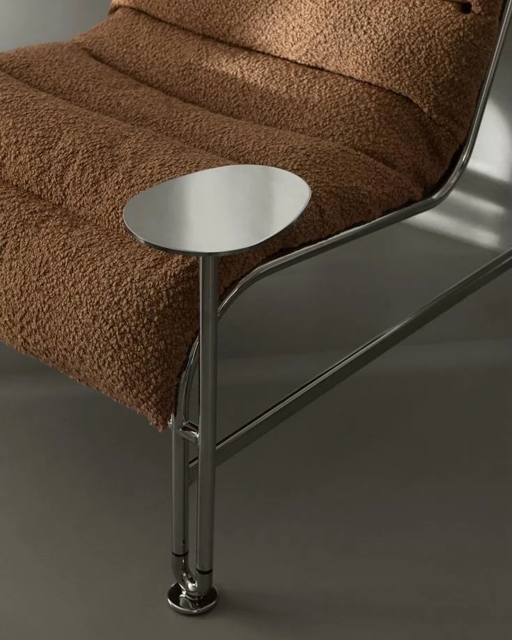 Sunny with side table by @lammhults 
@notedesignstudio + Gunilla Allard

A small detail, rethinking how we sit.

The integrated side table extends Sunny beyond seating - a seamless addition for coffee, work or pause, anchored by the signature U-shape