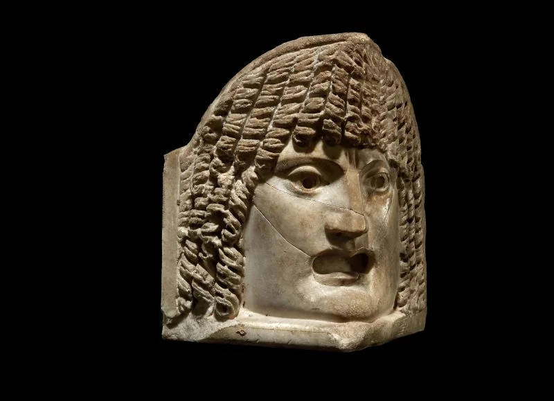 CREDIT: Gallery. Kallos Gallery. A Roman marble theatre mask acroterion, 3rd century AD