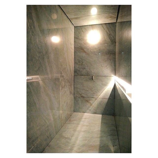 The secrete Prada VIP Elevator. Supply and installation of Green Lugana marble on lightweight honeycomb panels complete with hidden bench integrated into the rear wall along with custom controls hidden in the wall makes this best kept secret all the 