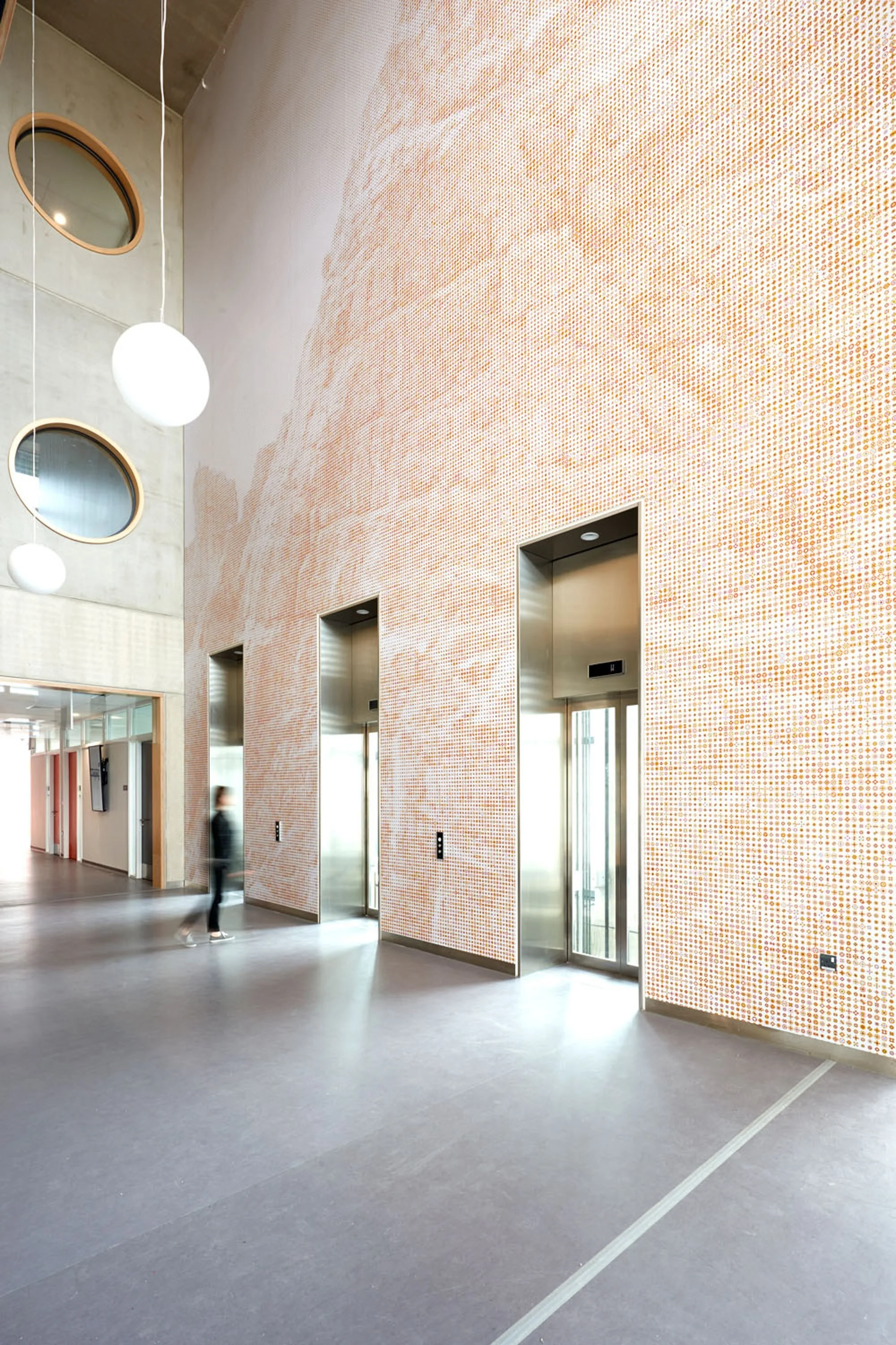 Renowned Artist Karel Martens Creates a Wonderful Elevator Wayfinding Mural for UK Hospital