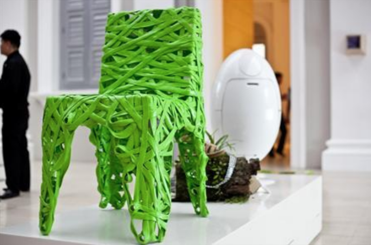 Qi-global-launch-green-chair.png