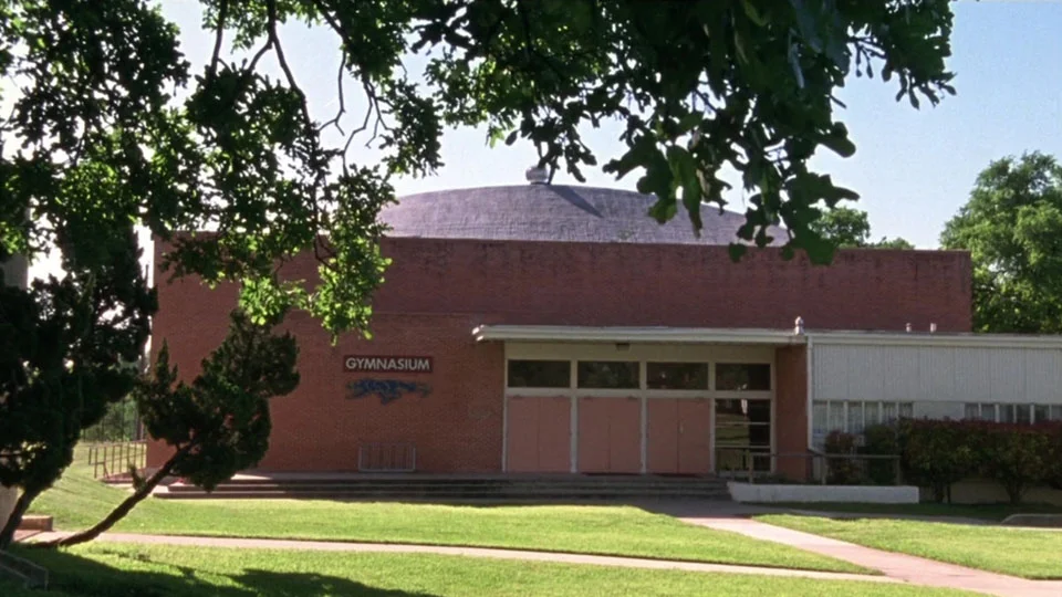 The high school gymnasium in Waiting for Guffman - © 1996 Castle Rock Entertainment