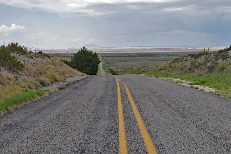 A deputy drives past this spot in No Country for Old Men , as seen in July 2017