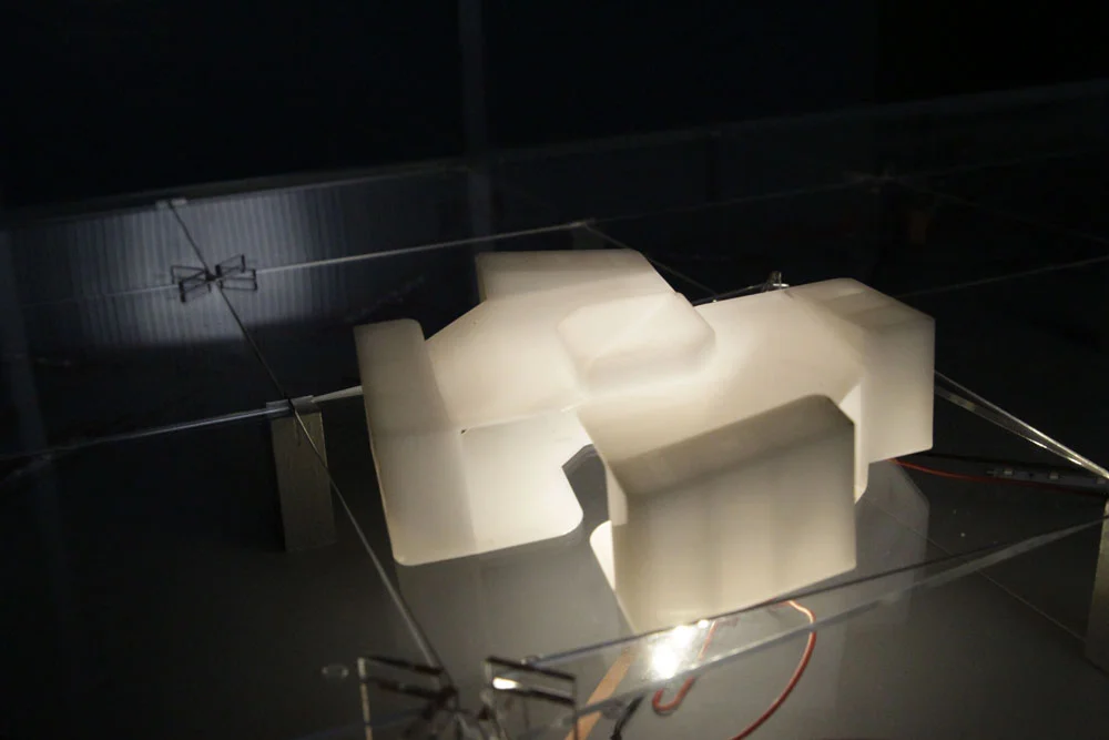 Assemblage lamp: two identical plastic pieces from solar panels transport;