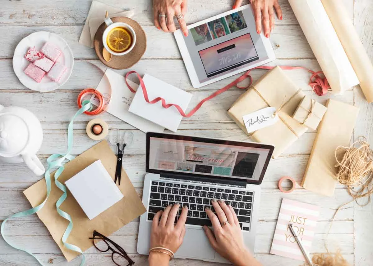 Creative entrepreneurs designing a business website