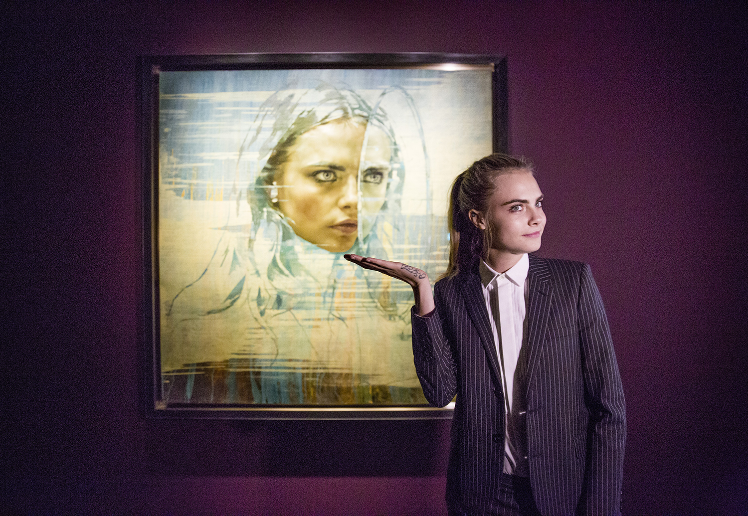 Cara Delevingne shows off her portrait