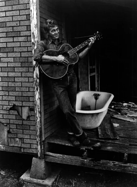 Steve McQueen with Guitar by Bathtub, Columbus, Texas, 1963