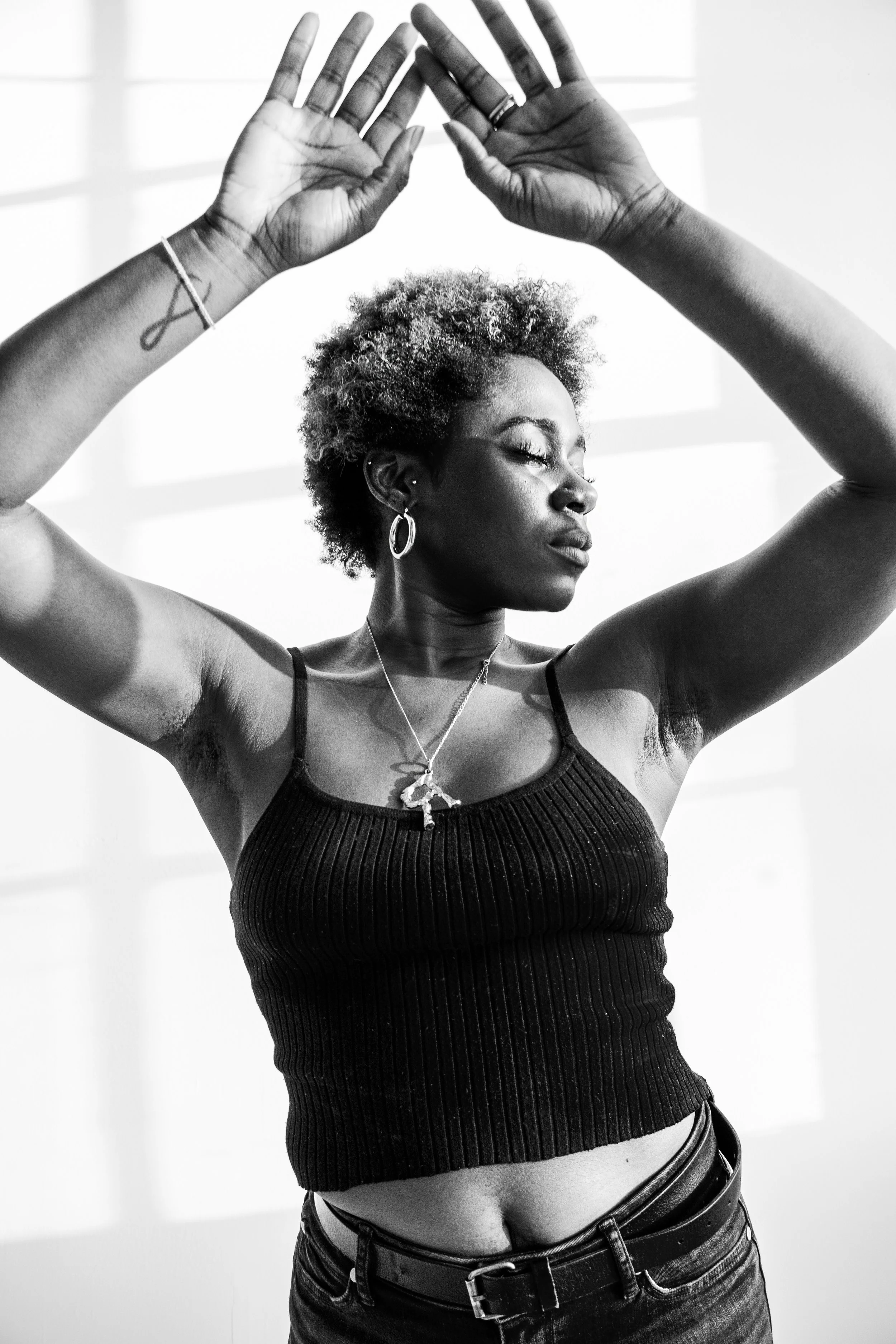 rashida_hands_up_tabbytha_ferguson.jpg