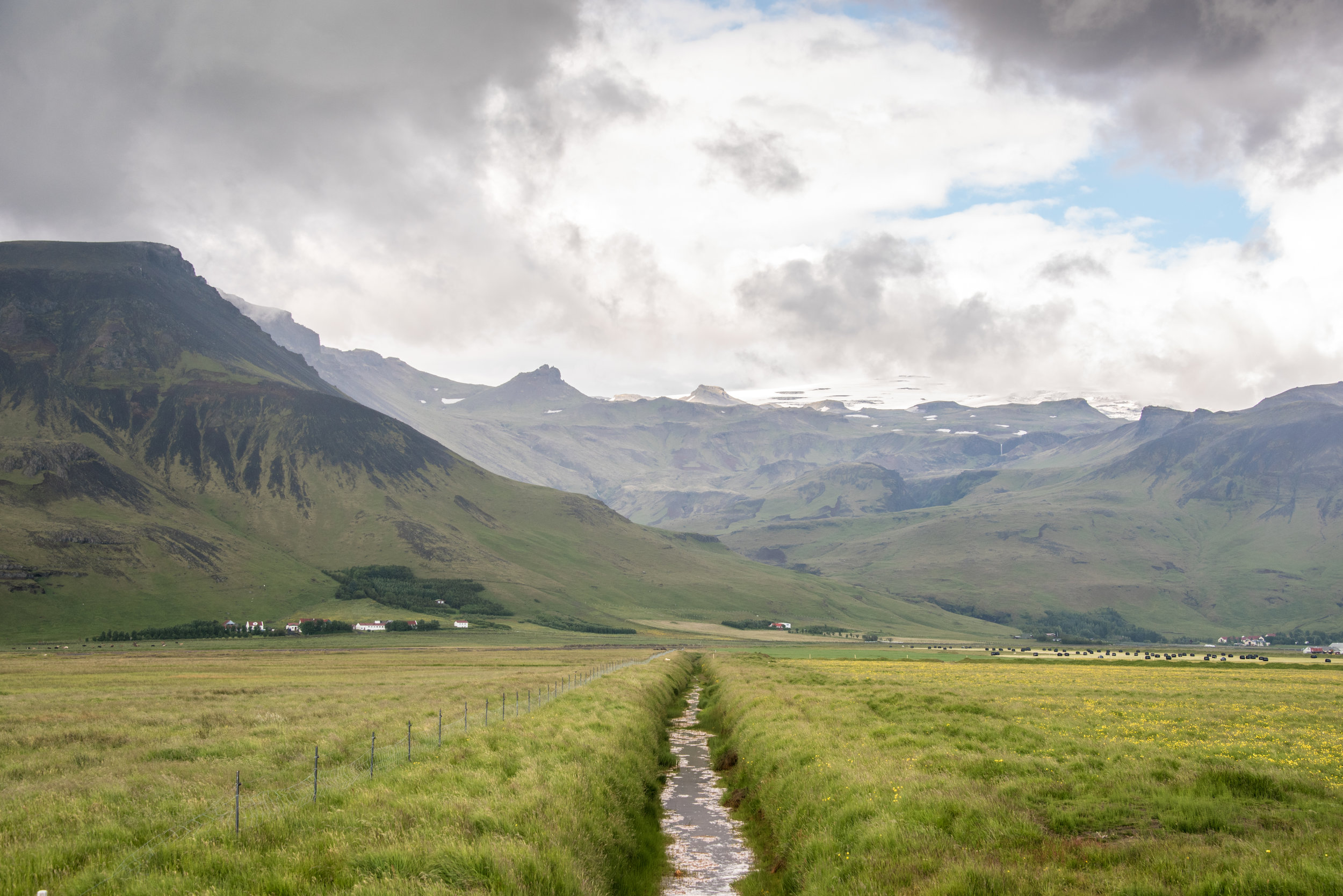 The highlands, off in the distance, are a more remote section of the island with fewer people, local or tourist alike.