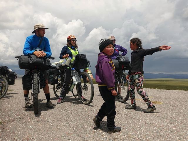 On our way to the Kyrgyz border, these cute kids stopped us to see if we wanted some hot tea, fresh bread, or a rest in their nearby yurt. With a storm brewing on the horizon, we were all too happy to duck for cover and spend a little time with this 