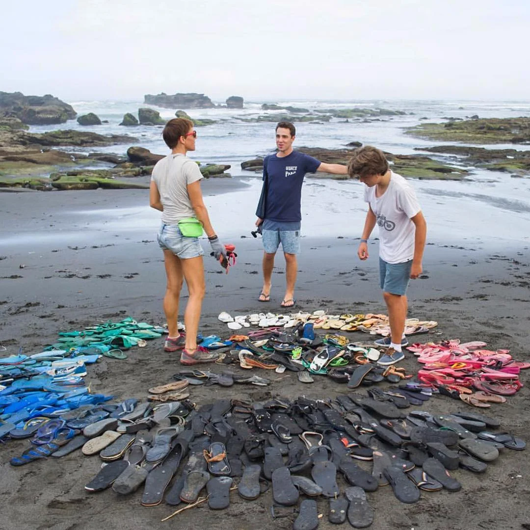 This Artist turns Discarded Flip Flops into Rainbows to Address Plastic Pollution