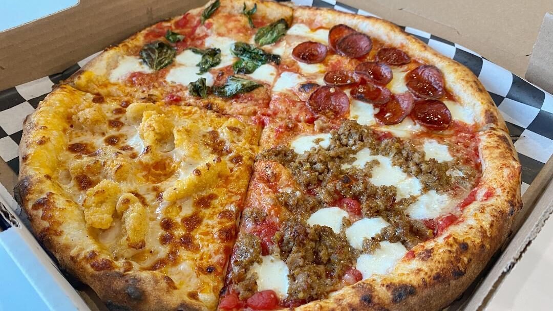 Mootz Pizza: Best in Westside & easy on the planet! They toss pizza, compost boxes, and recycle Coke bottles. Slice up sustainability!