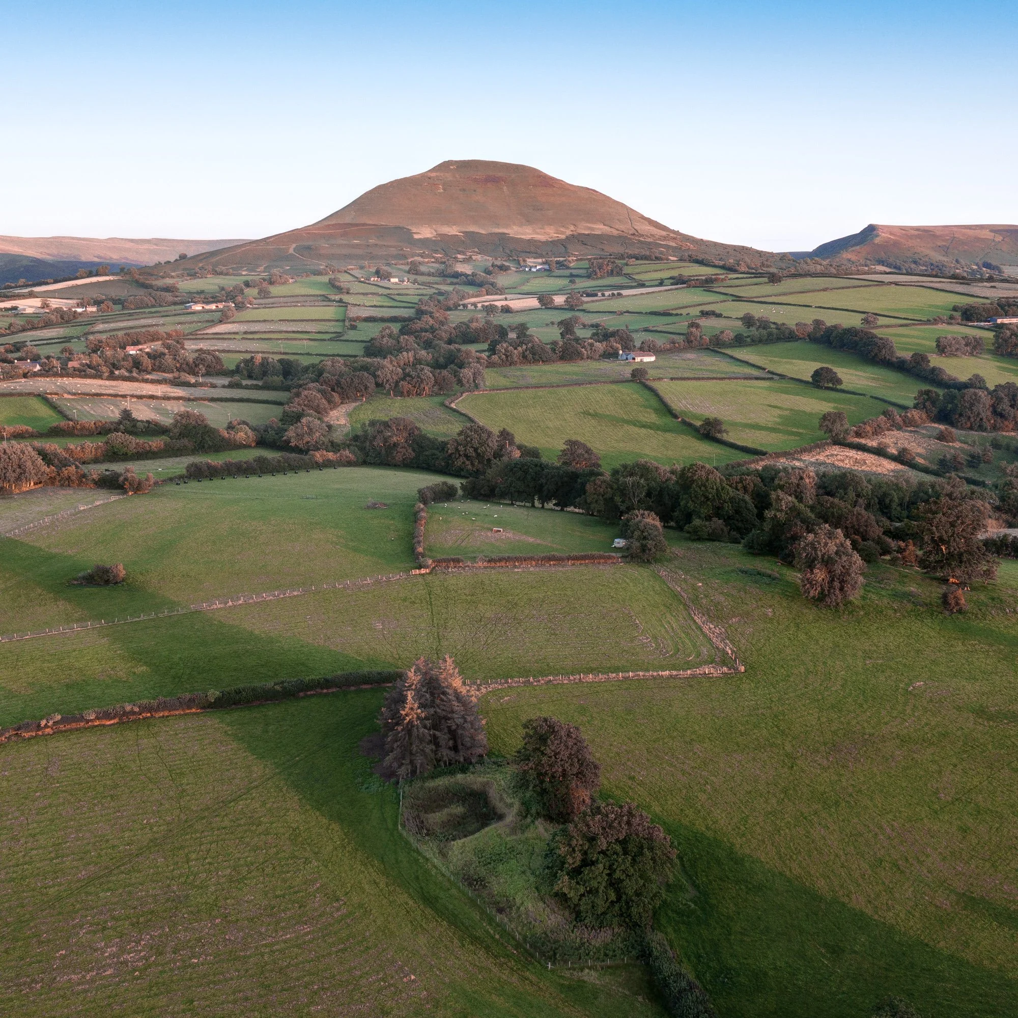 Penywyrlod long barrow, Powys, with Mynydd Troed in background