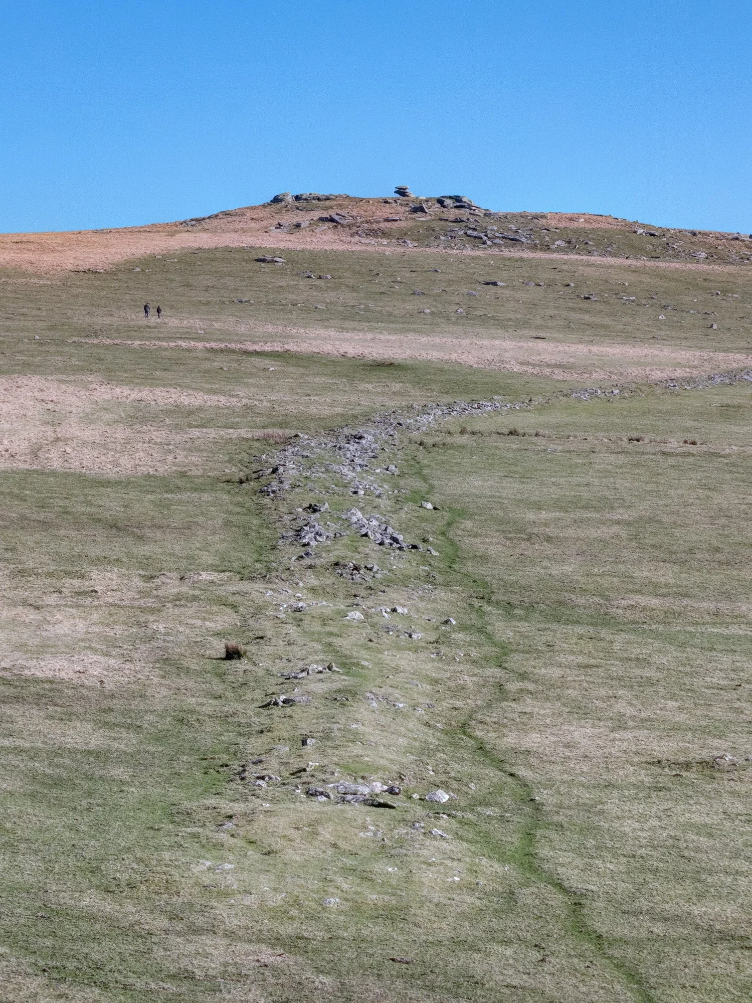 Rough Tor long cairn, with Showery Tor on ridge