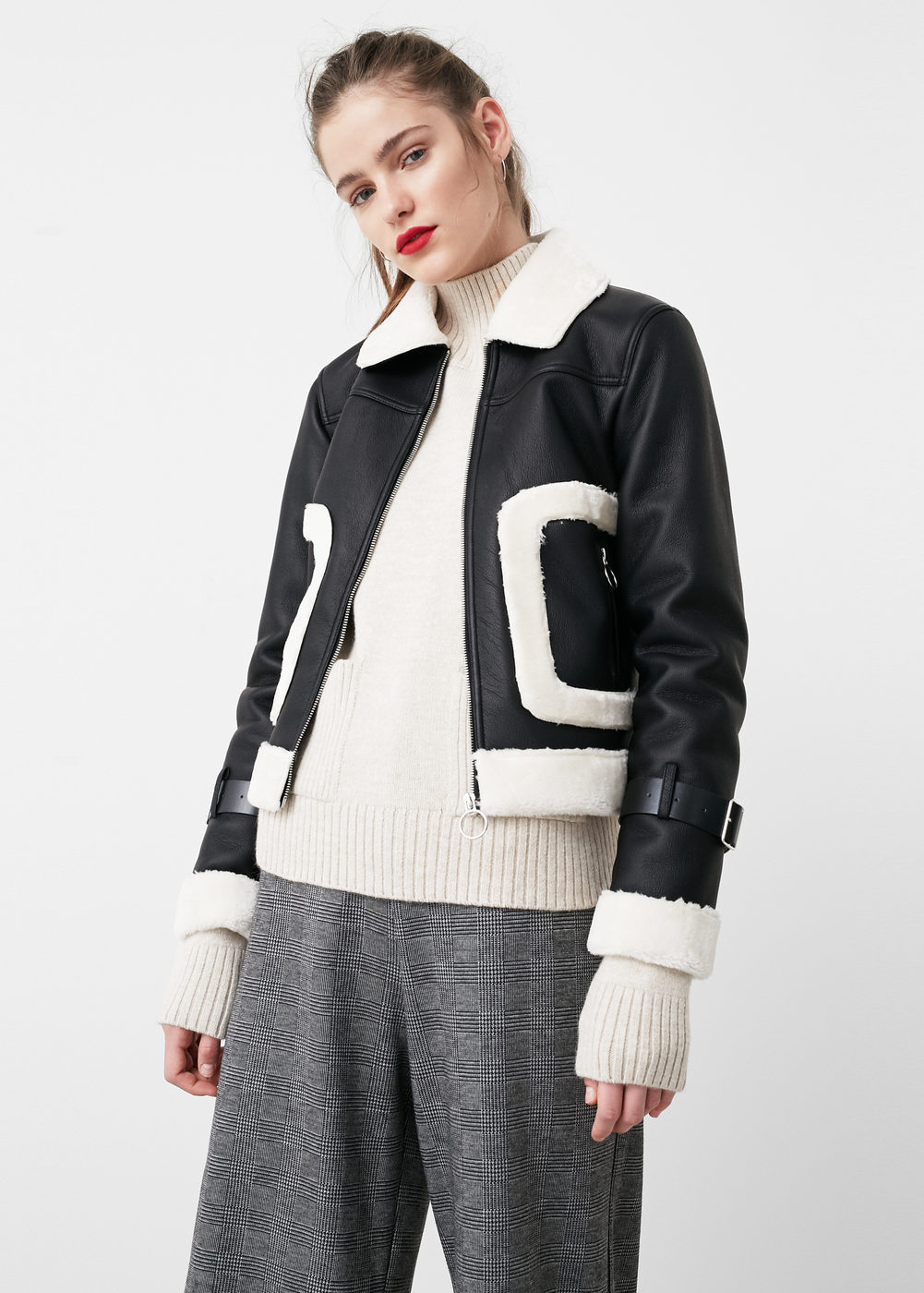 Everyone needs a good leather jacket (faux in this case) and this one is perfect for any occasion! The stand out detail of the white fur on not only the collar but also the cuffs and hem combined with the belt around the wrists makes all the difference. 