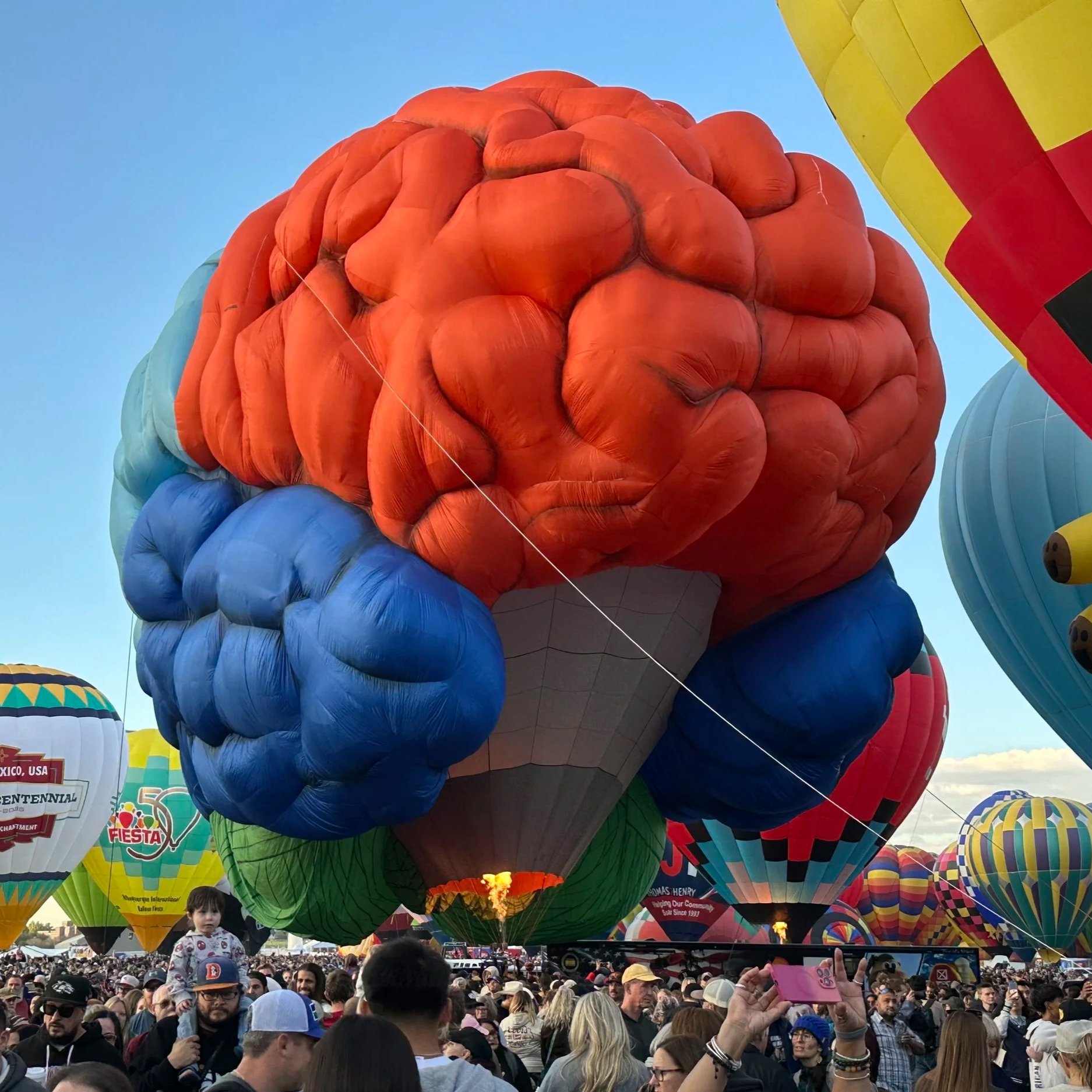 Brain shaped hot air ballon at Ballon Fiesta in Albuquerque after a site visit with collaborator Jeremy Hogeveen.