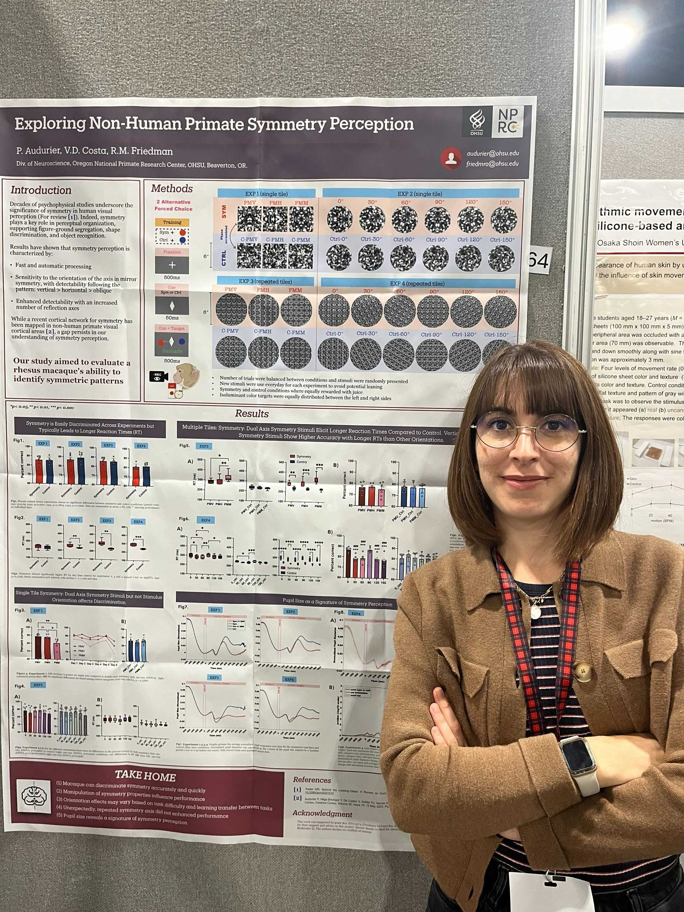 Pauline Audurier presents her poster on symmetry perception in macaques at VSS.
