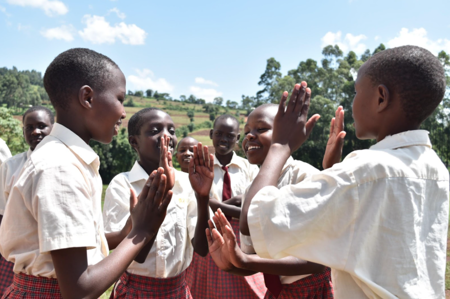 Girls play at the KCE boarding school.