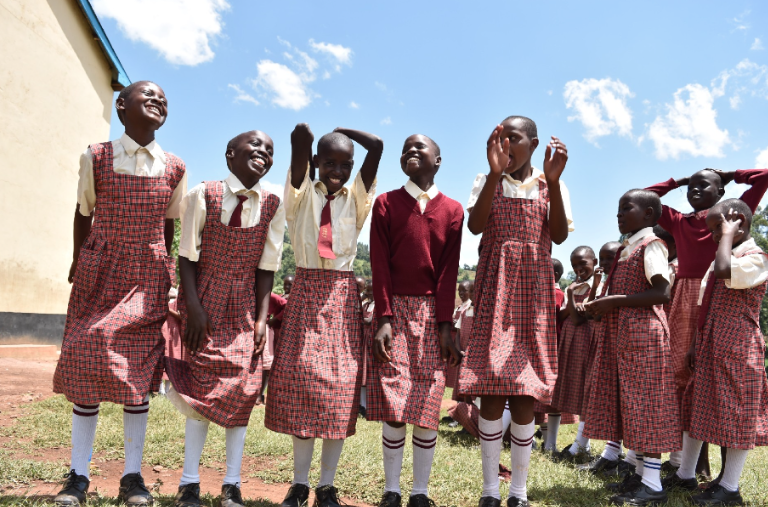 A group of girls celebrate a beautiful day in Enoosaen