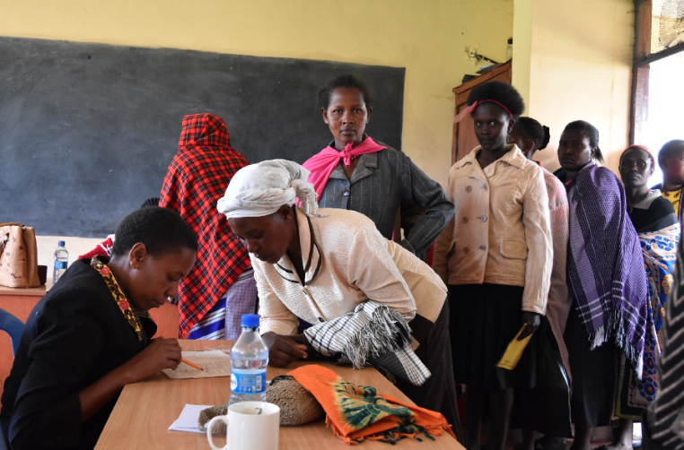 Family members come to KCE on enrollment day