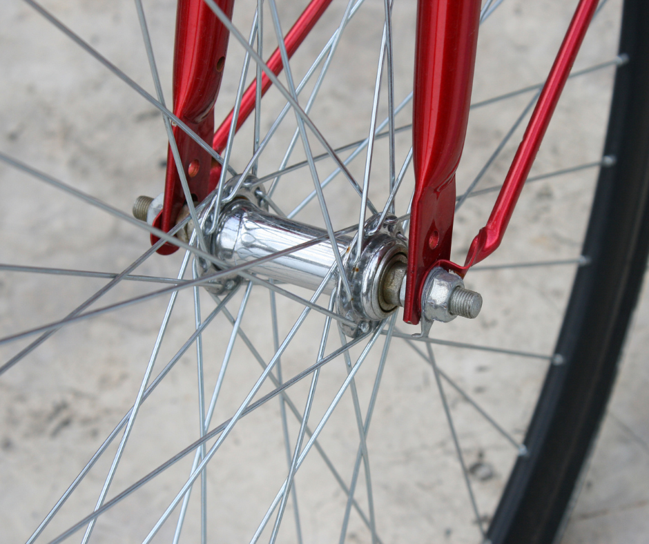 red bicycle wheel for Ritual health acupuncture in Berkeley California in San Francisco East Bay